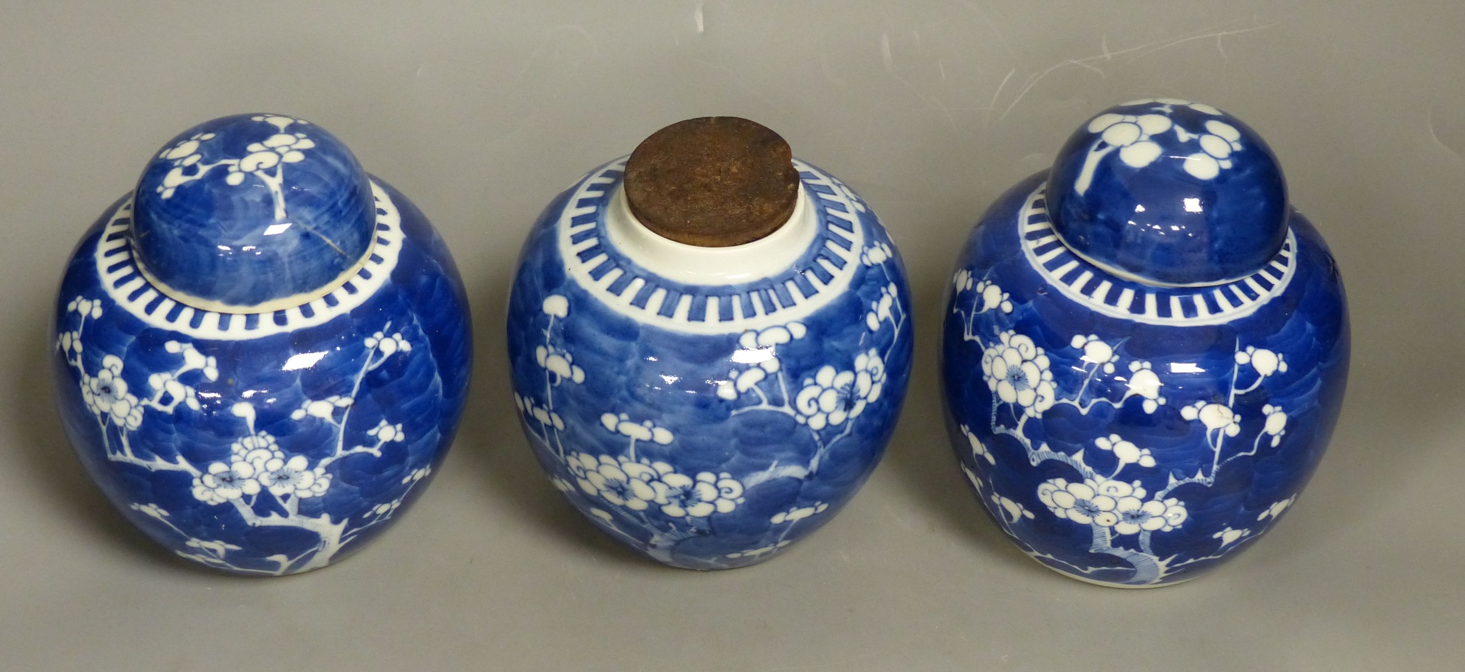 Three Chinese blue and white prunus jars, late 19th century/early 20th century